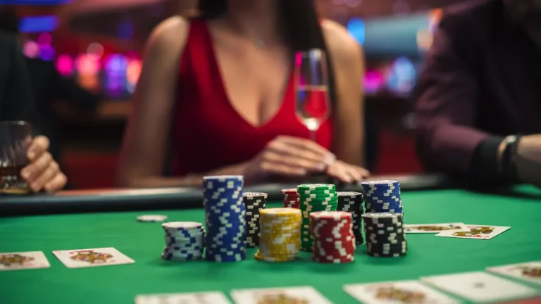 Glamorous woman playing hold'em poker at the casino.